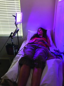 Patient on bed receiving dynamic light treatment