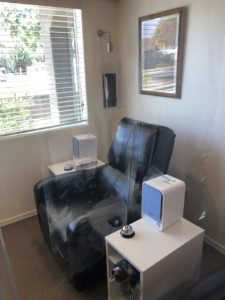 IV room with plastic partition and air purifier and chair